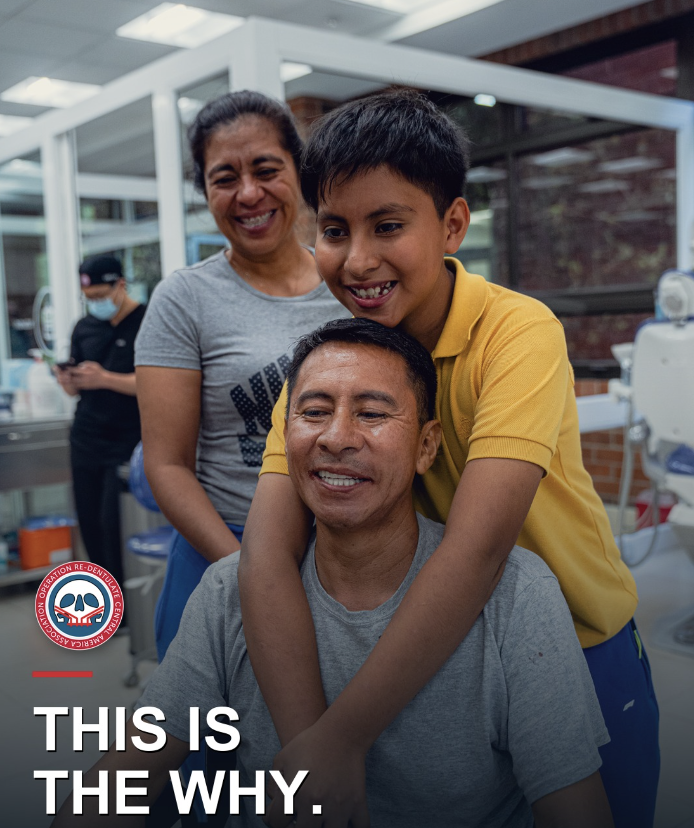 A smiling patient and family members at a dental clinic in Guatemala